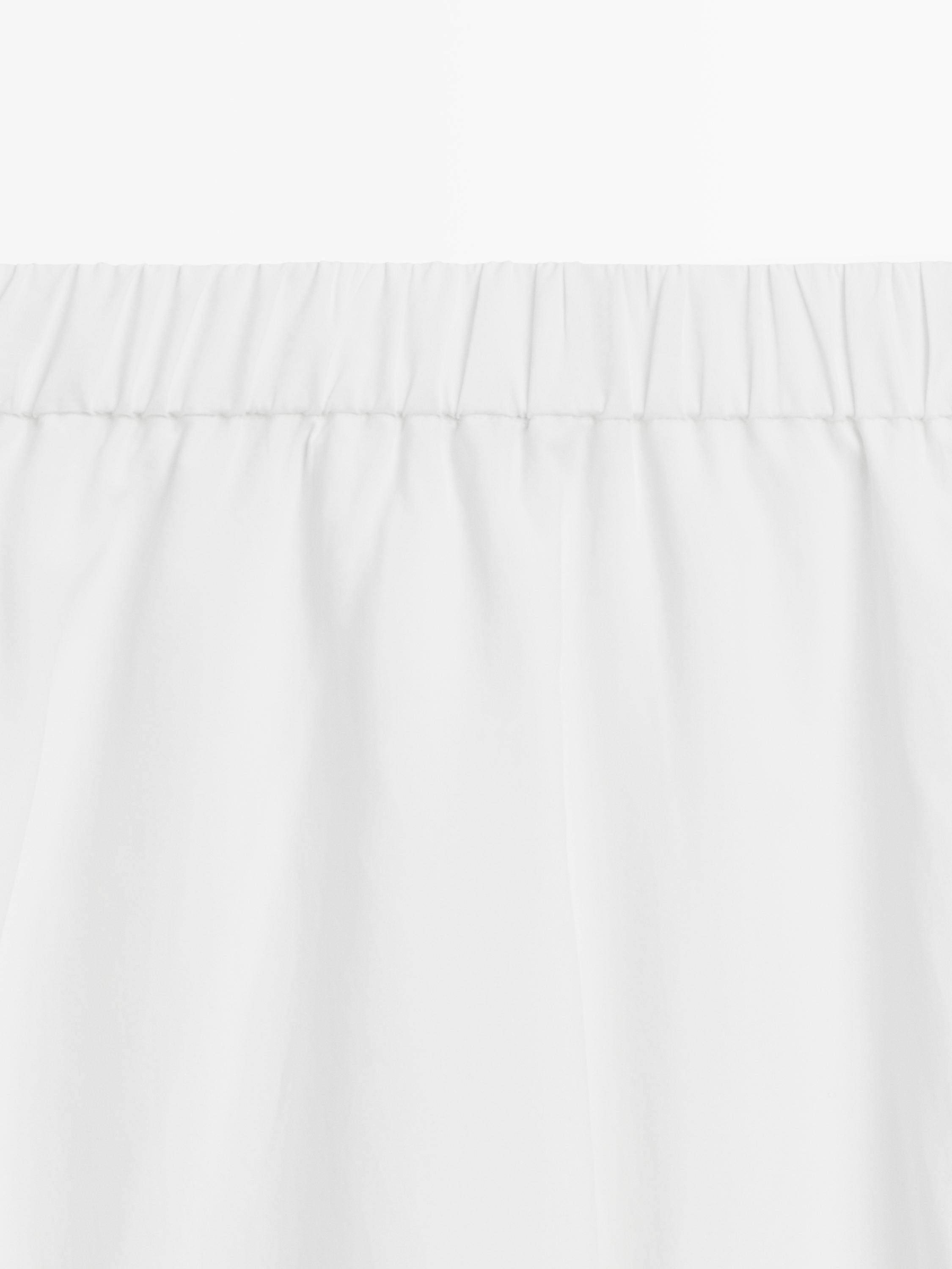 Jupe midi fluide détail élastique